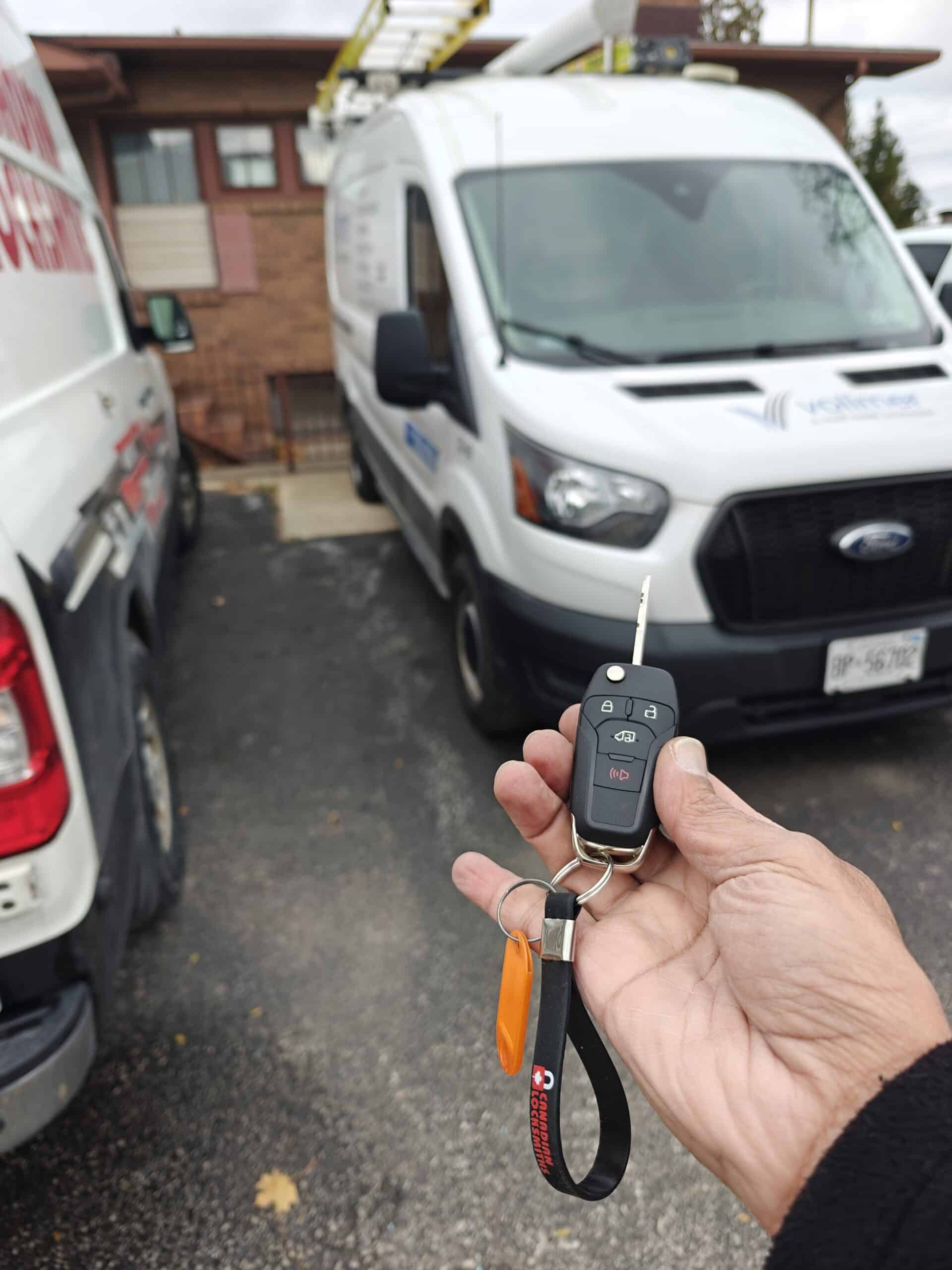 Ford Transit replacement key cut and programmed in a Sandwich parking lot by Canadian Locksmiths.