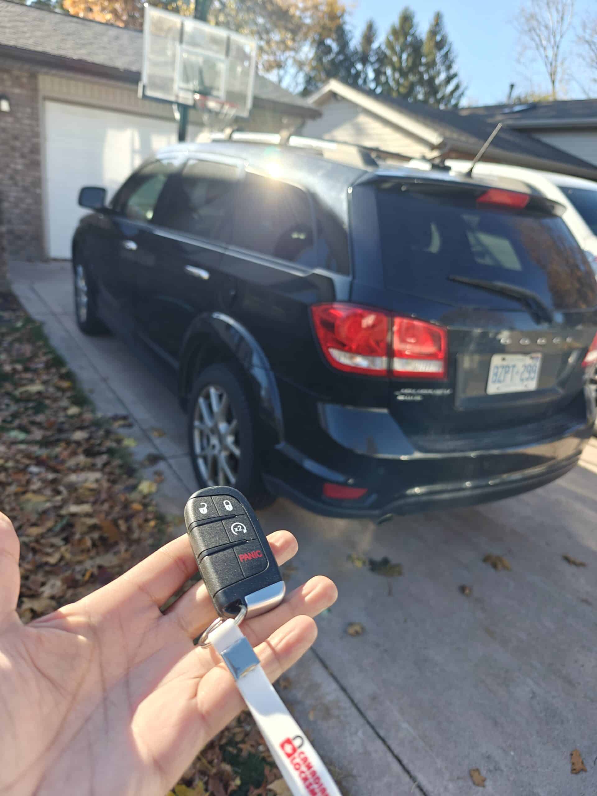 Dodge Journey push-to-start spare key programmed at a LaSalle driveway by Canadian Locksmiths.