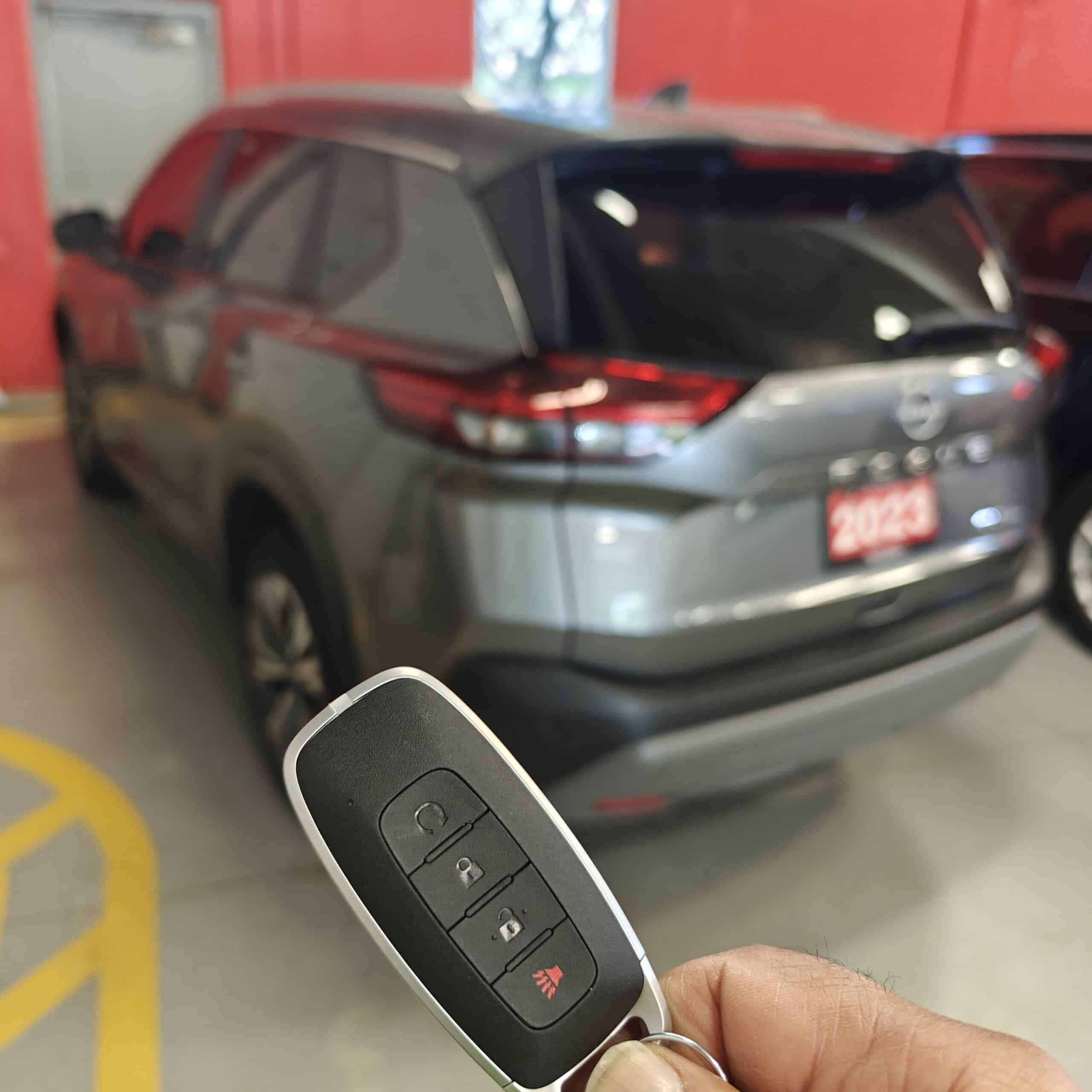 Push-to-start key fob programmed for a 2023 Nissan Rogue at a LaSalle used car dealership.