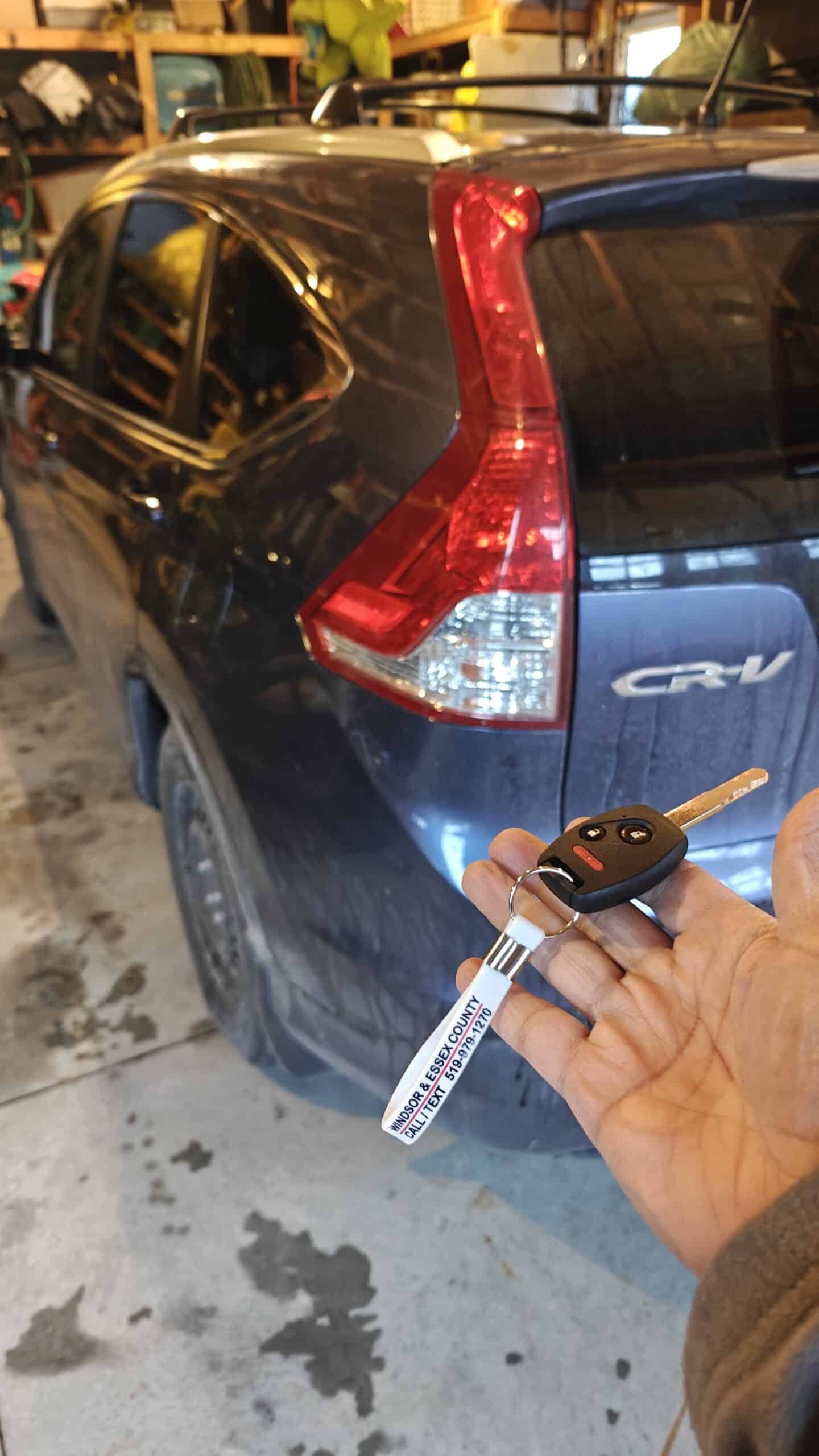 Honda CR-V all-keys-lost replacement programmed at a LaSalle driveway by Canadian Locksmiths.